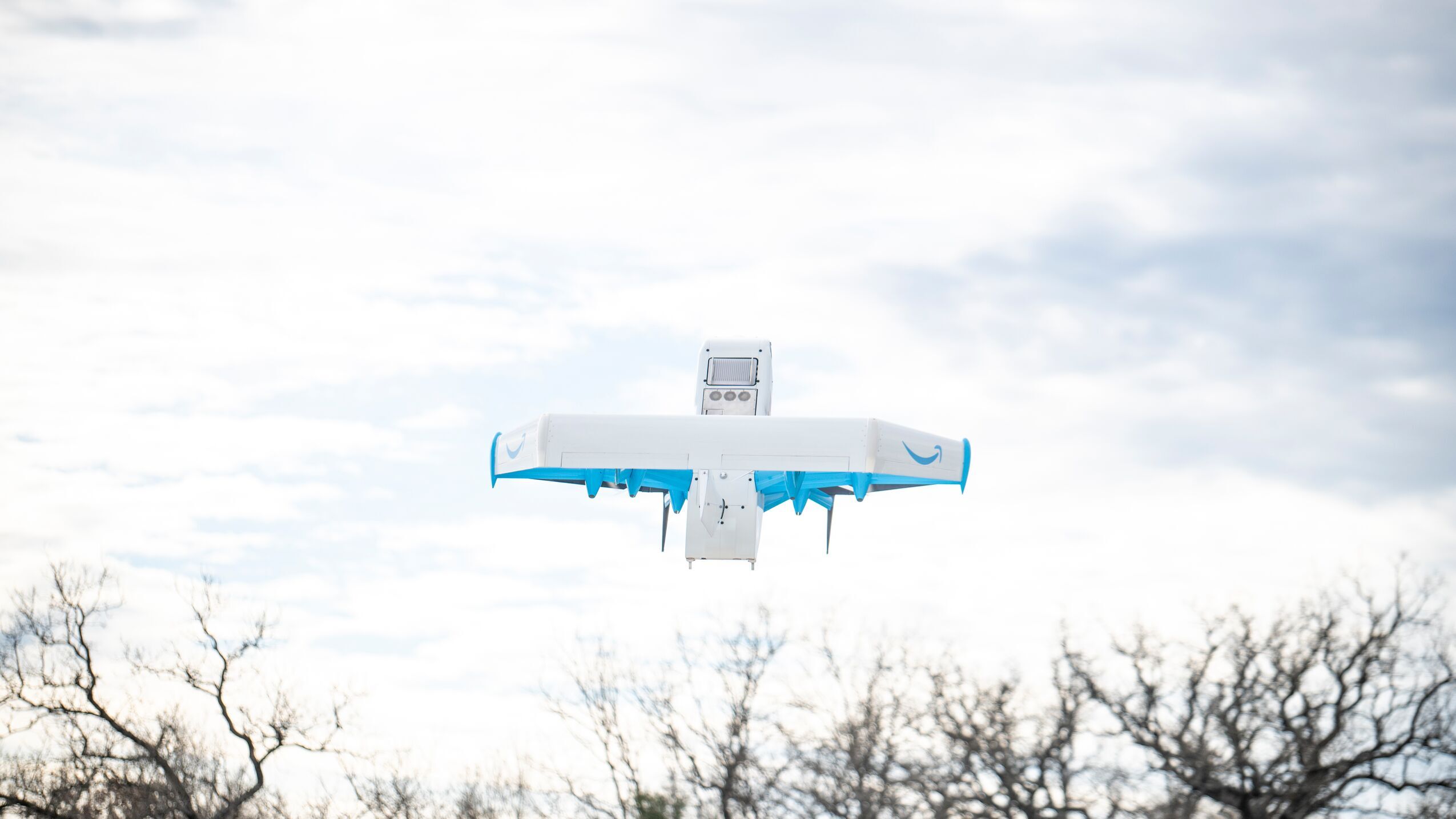 A Prime Air aircraft in flight above an operating site. Image: Amazon.