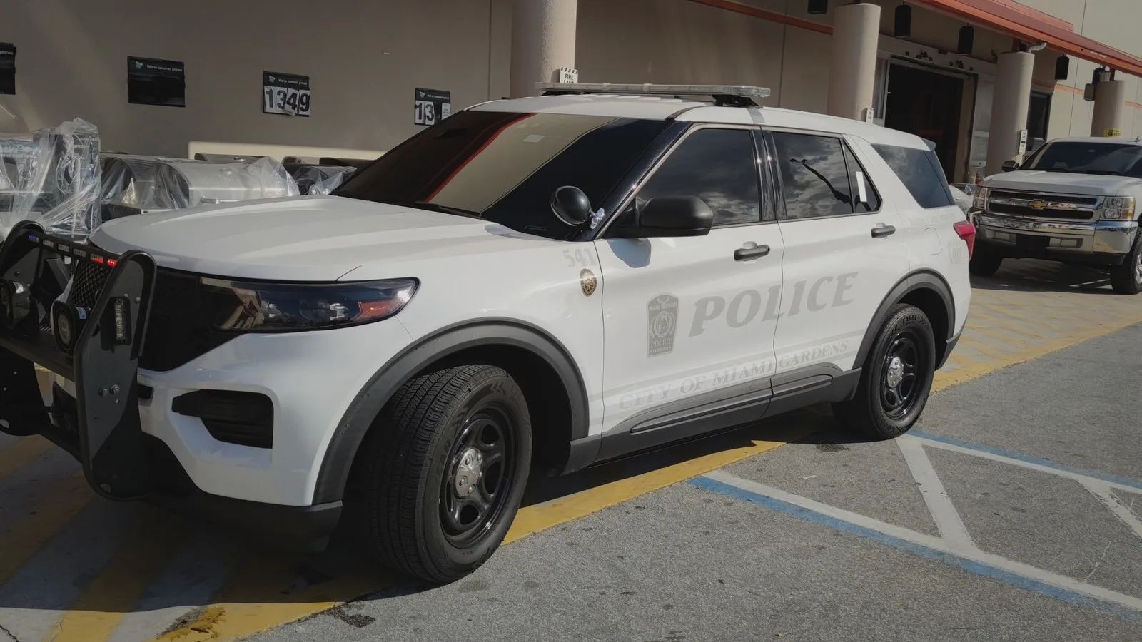 City police patrol vehicle parked outside a station