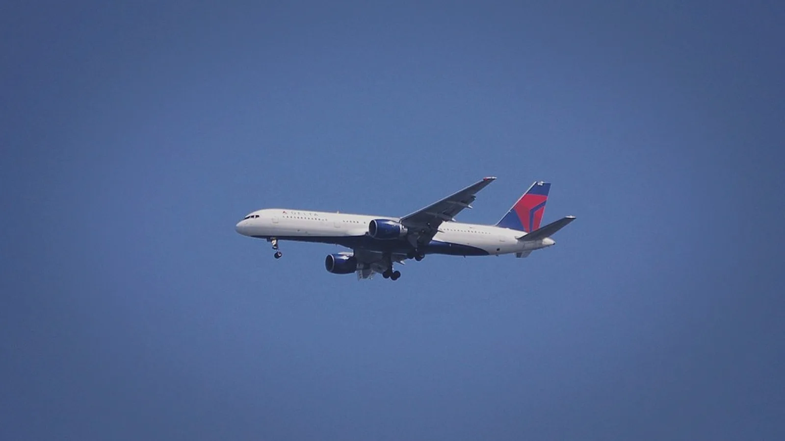 Commercial jet airliner on final approach to an airport